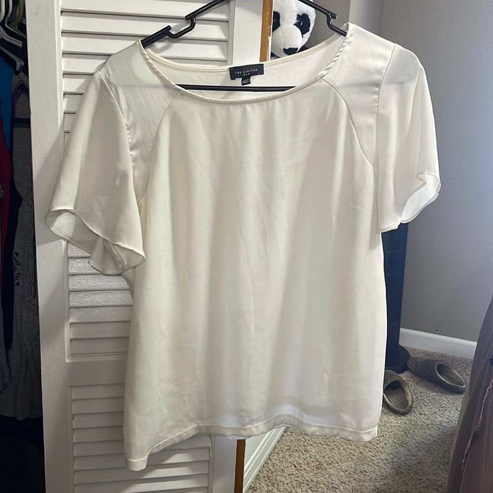 White blouse. The Limited brand in a size Large. Never worn